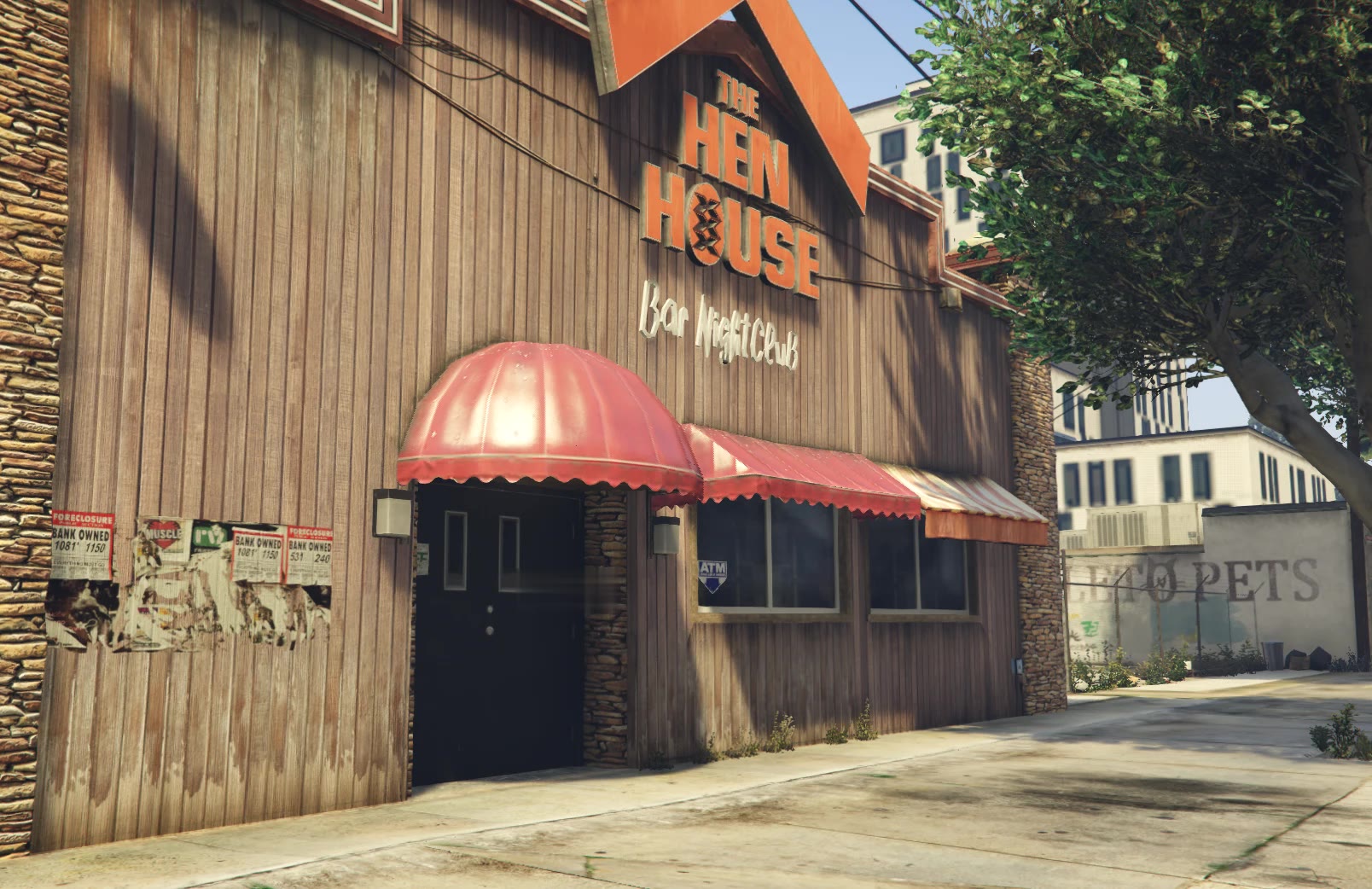 The Hen House bar and nightclub at 1782 Paleto Blvd, its timber front still carrying peeling foreclosure notices